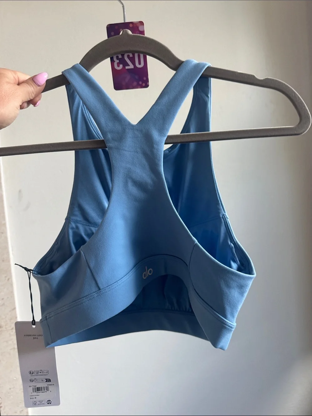 23. ALO Lock in Blue Keyhole Sports Bra